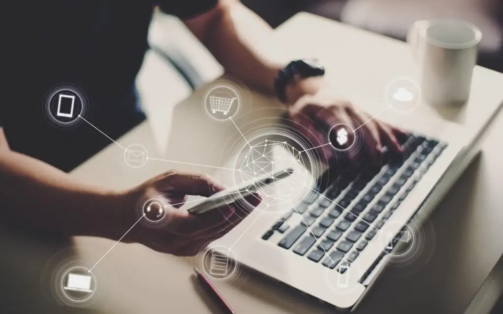 a print of Man holding smart phone making online shopping and banking payment. Blurred background .