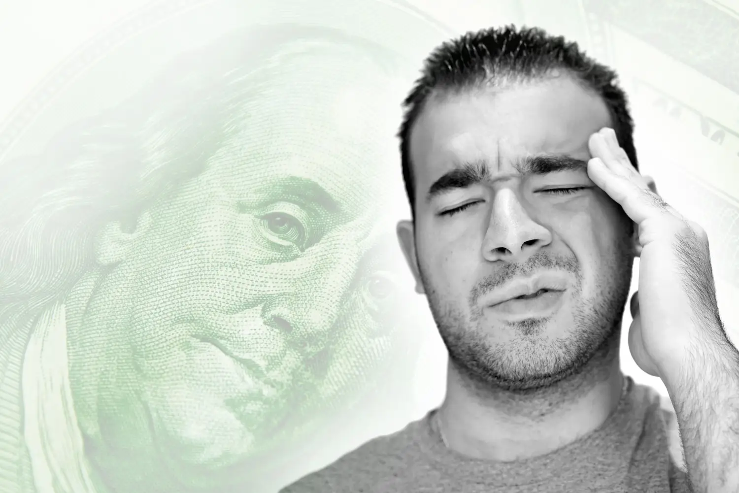 A man holding his head in pain, with an enlarged, faded image of Benjamin Franklin from a $100 bill in the background, visibly grappling with financial anxiety.