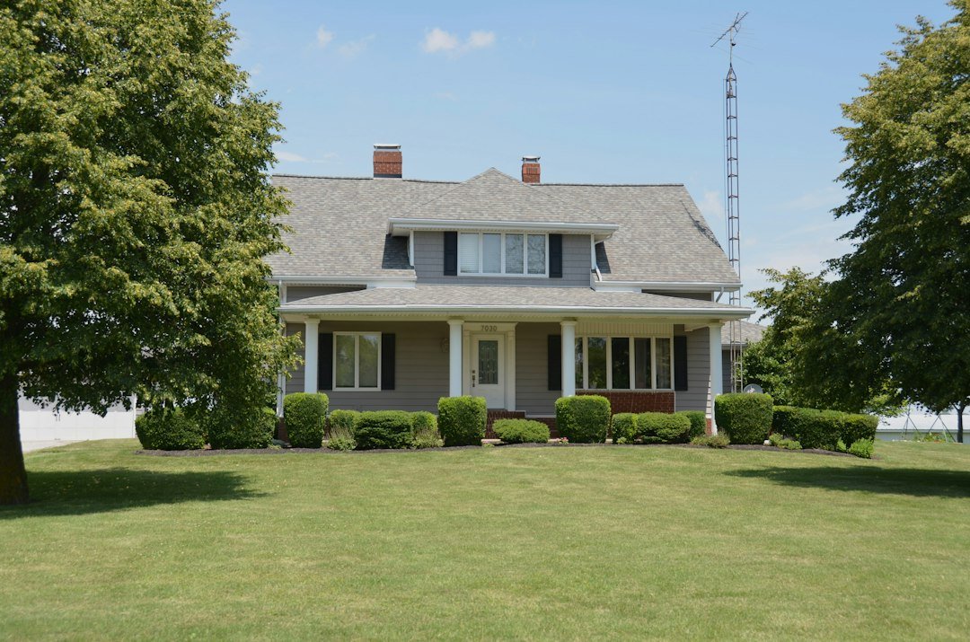 A restored home exterior illustrating housing choices for buying, renting, or staying put