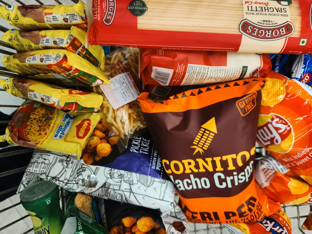 Groceries in a shopping cart illustrating single parent food-budget planning